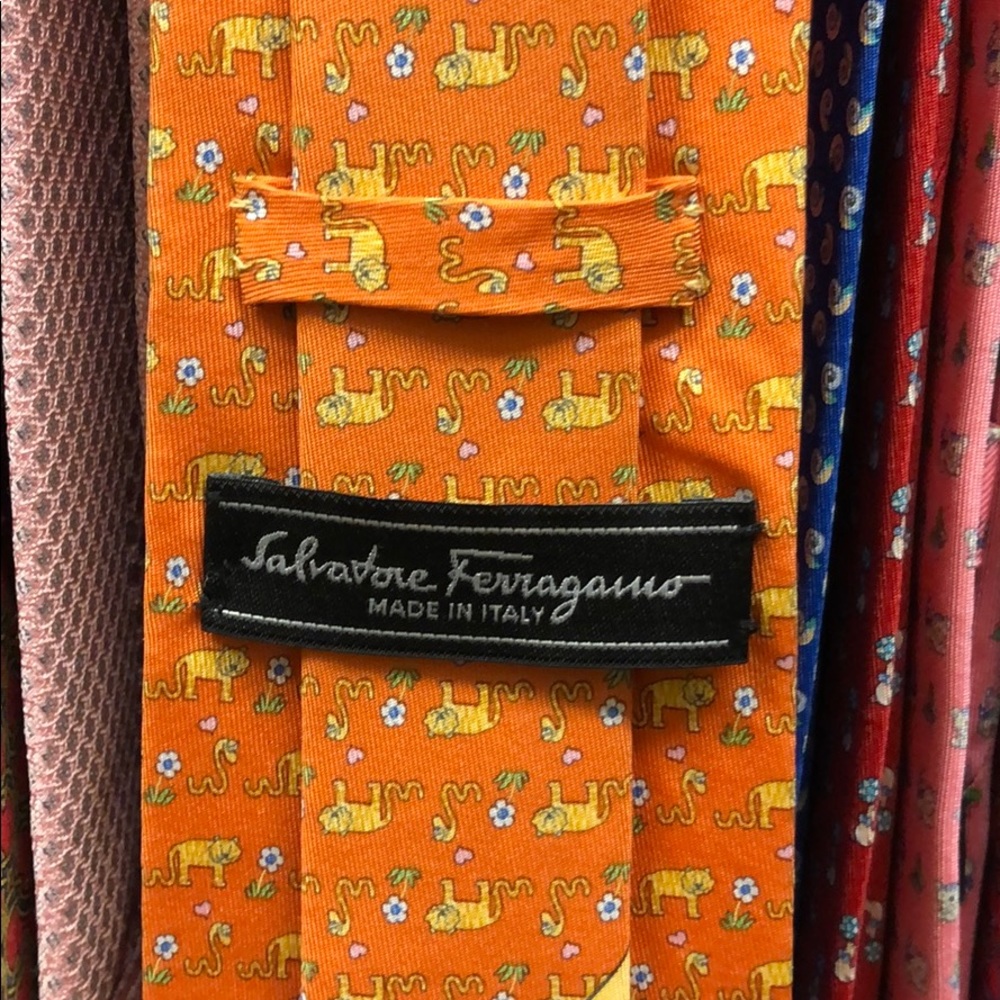 Ferragamo tie. Orange and yellow. Animals print.
